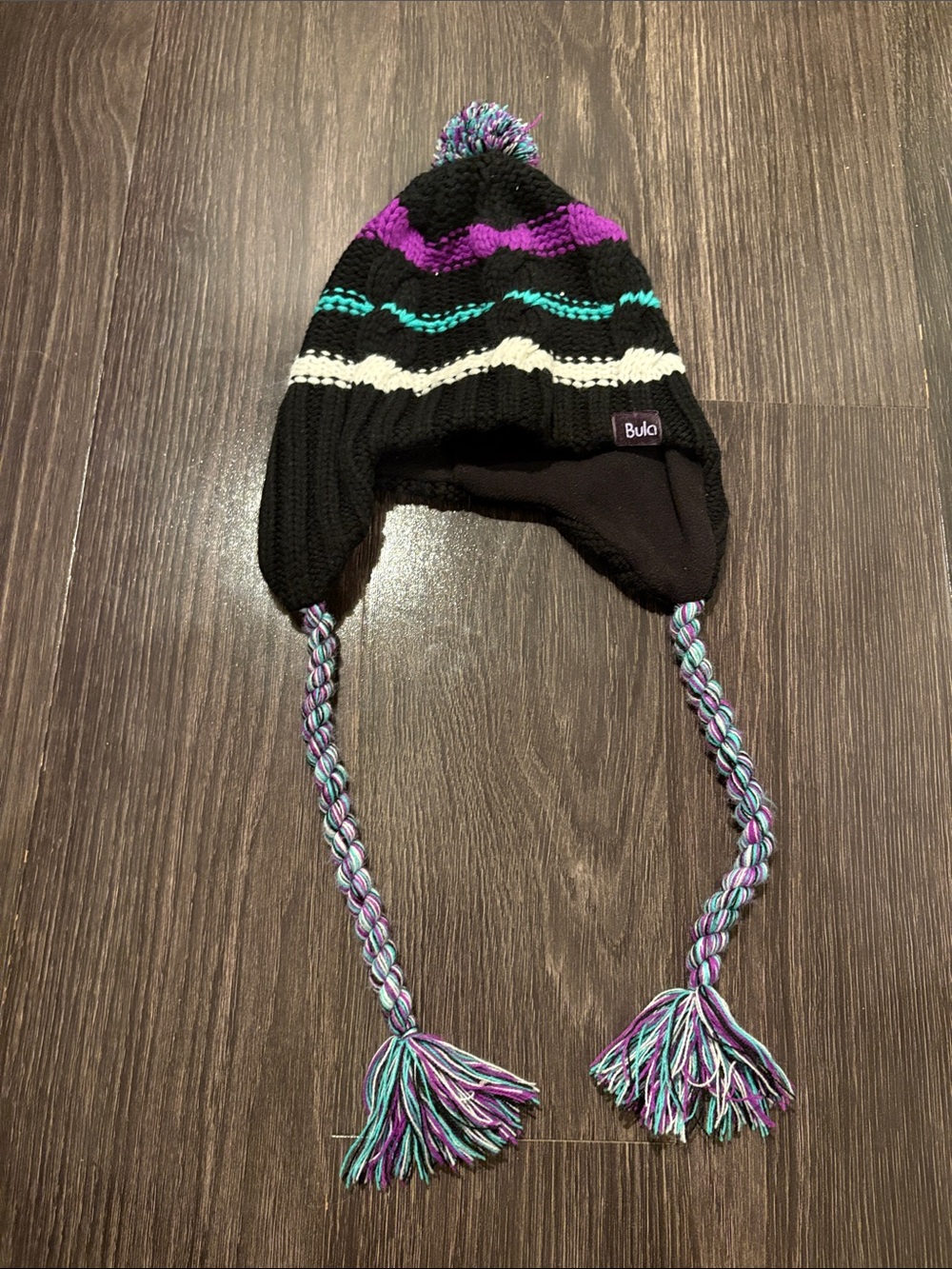 Bula winter hat with pompom black purple teal